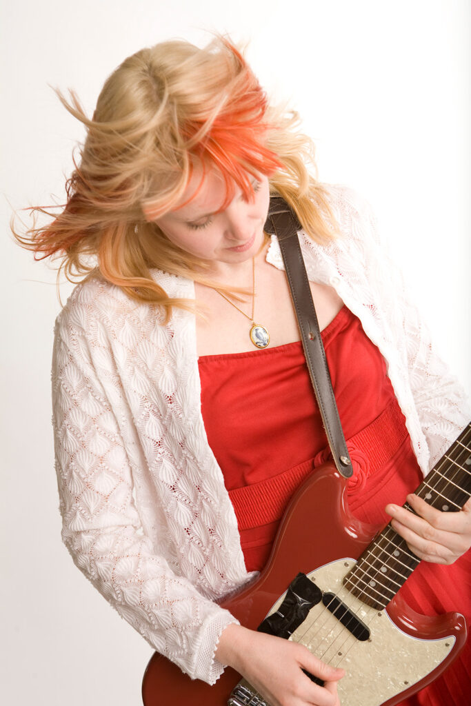 Kelly Buchanan on guitar